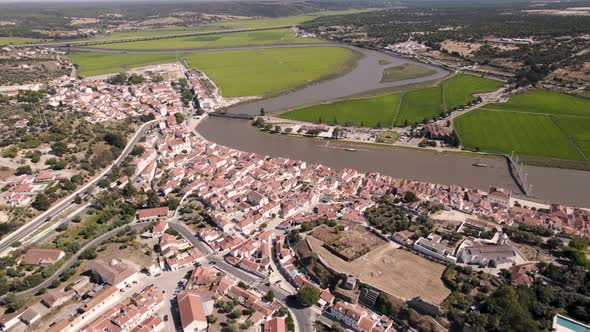 Beautiful Portugal town of Alcacer Do Sal in high angle drone view alt