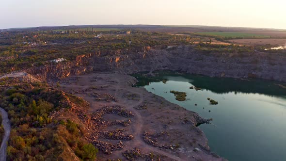 Old Flooded Stone Quarry Site of Natural Granite Stone Mining alt