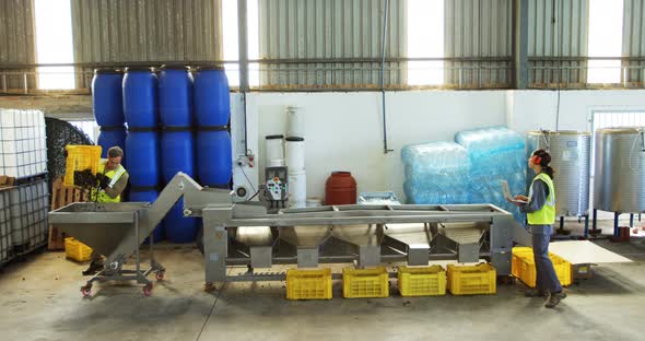 Workers working at factory alt