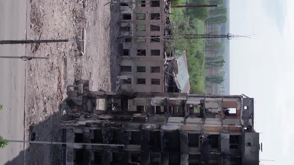 Vertical Video of Civilian Cars Destroyed During the War in Ukraine alt