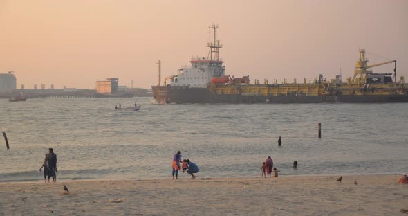 Ship On Beach Sea Waves With People Crowd India Slow Motion