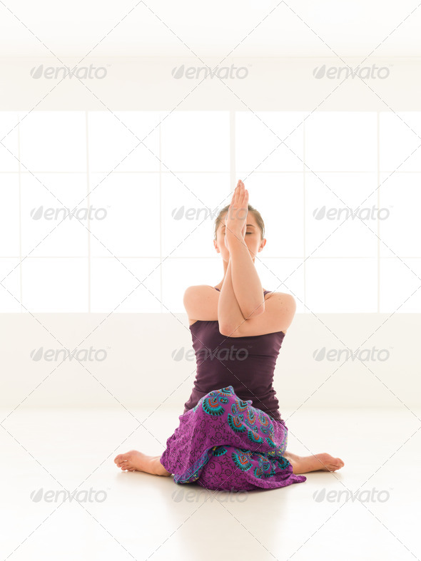difficult yoga pose Stock Photo by shotsstudio