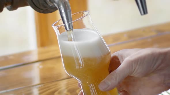 Slow Motion Pour of a Hazy IPA on Tap