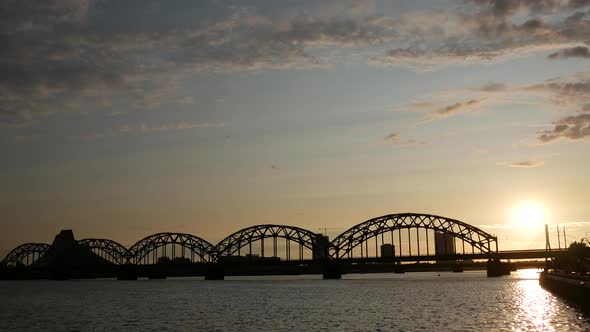 Time lapse from the Railway Bridge during sunset in Riga Latvia alt