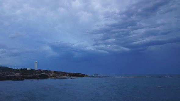 Lighthouse And Ocean Storm