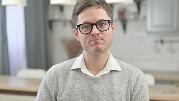 Thumbs Down By Disappointed Young Man alt