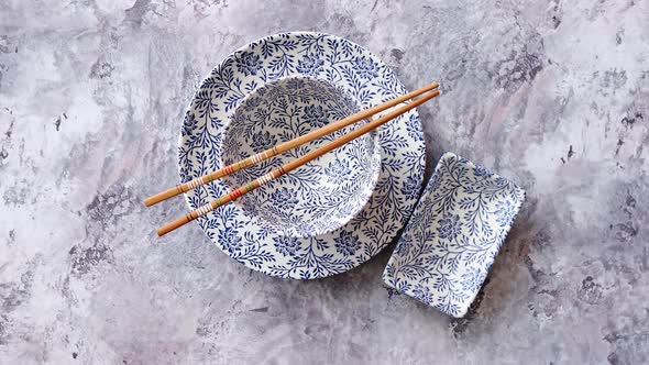 Empty Traditional Set Tableware From Asia. alt