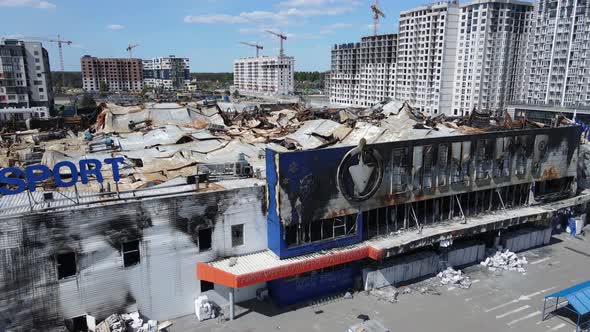 Wartorn Building of a Shopping Center in Bucha Ukraine alt