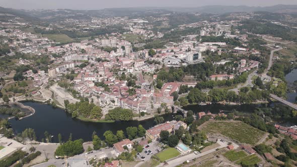 Birds eye view featuring parish townscape, tamega river and famous Sao Goncalo monastery. alt