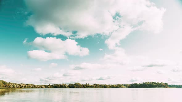 Lyepyel District, Vitebsk Province, Belarus. Summer Cloudy Sky Above Lepel Lake. Time Lapse. , alt