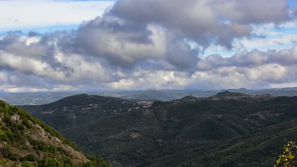 Piemonte valley aerial view timelapse during day. Piedmont region in Italy, district of Cuneo. Sceni alt