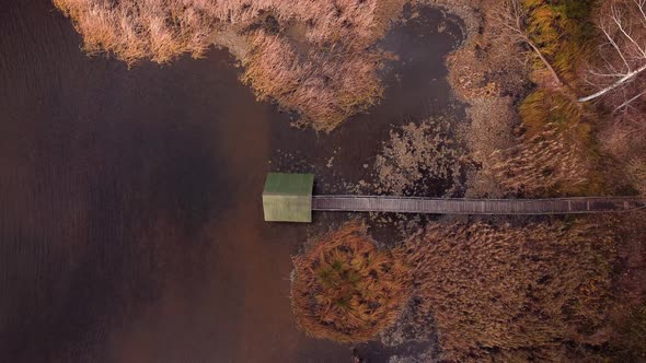 Autumn video of a small house for recreation on water