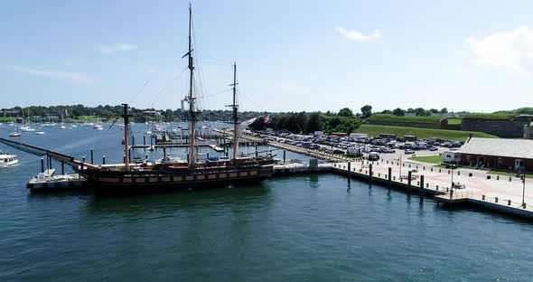 Oliver Hazard Perry afloat at dock near Fort Adams in this 4k drone shot. alt