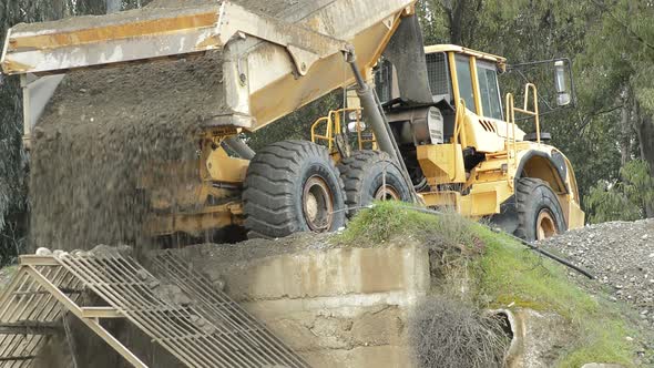 Construction Truck Unloading River Sand alt