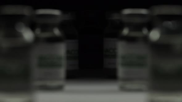 Focus on a Flask of Vaccine for COVID19 Coronavirus Cure in Research Laboratory alt