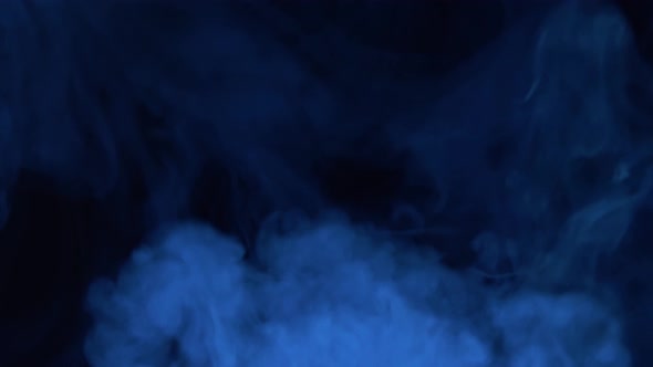 Smoke texture over blank black background. Mystical steam at night. alt