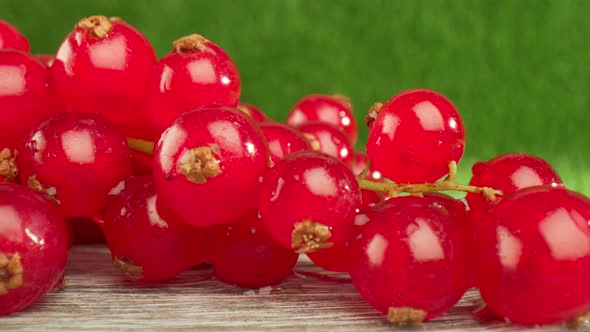 Redcurrants on a Wooden Table alt