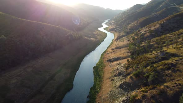 Aerial Flying Over a River in the Mountains of California alt