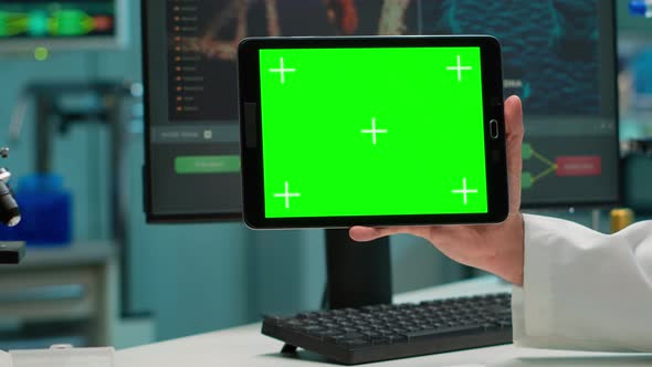 Close Up of Scientist Man Holding Tablet with Isolated Display alt