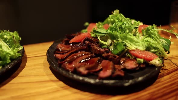 plate with beautiful cold cuts in sauce alt