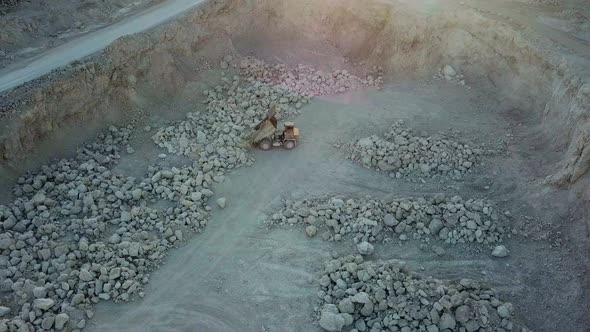 Aerial View of Opencast Mining Quarry with Lots of Machinery at Work  View From Above alt