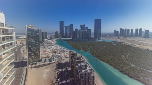Buildings on Al Reem Island in Abu Dhabi Timelapse From Above alt