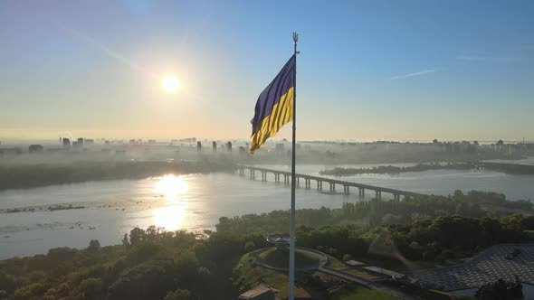 Ukrainian Flag in the Morning at Dawn. Aerial. Kyiv. Ukraine alt