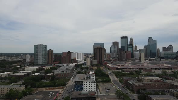 Aerial view of Minneapolis, Minnesota, with a variety of architectural features with gray cloudy sky