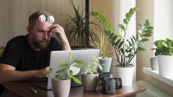 Bearded Man in Home Office