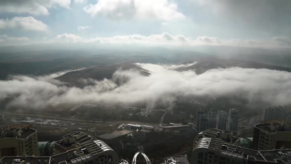 8K City Fog in the Valley Disappears