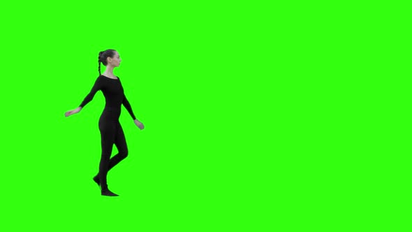 Dancer Walking Around Gently and Waving Her Hands Like a Swan with Green Screen. alt