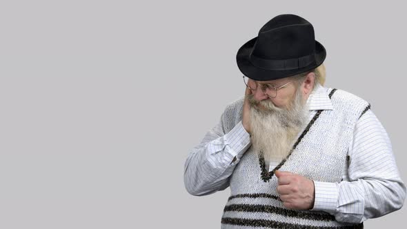 Old Retired Grandpa Suffering From Toothache alt
