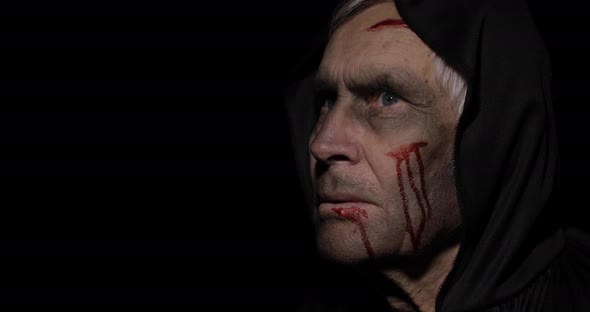 Old Executioner Halloween Makeup and Costume. Elderly Man with Blood on His Face alt