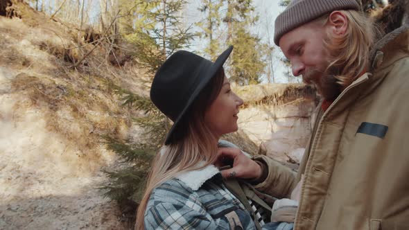 Young Romantic Couple Standing in Canyon alt