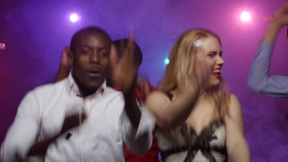 People of Different Nationalities Dancing at Party, Close-up Shift Camera alt