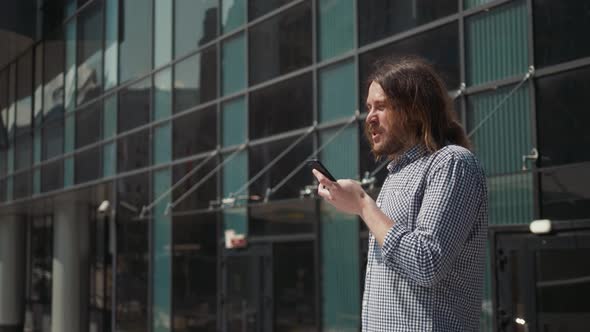 Man Using the Voice Recognition on the Phone, Audio Message Ai Speech Helper, Student Male Outdoor alt