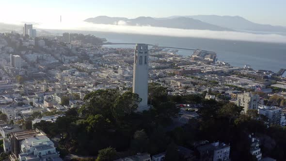 Aerial, San Francisco Coit Tower and cityscape, panning right drone 03. alt