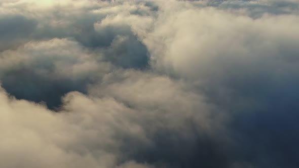 Background From Boiling Clouds at the Bottom Aerial Drone Shot alt