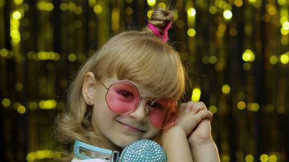 Child Dances, Listens Music on Headphones. Little Kid Girl Dancing, Having Hun, Relaxing, Enjoying alt