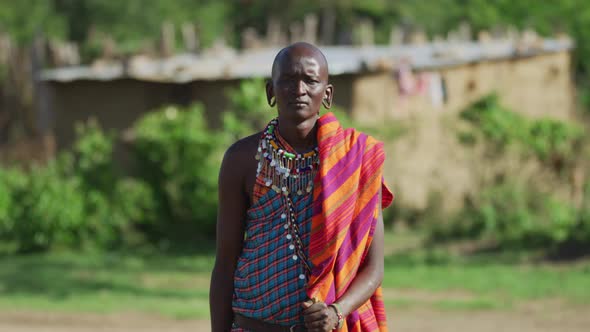 Maasai man with stretched earlobes alt