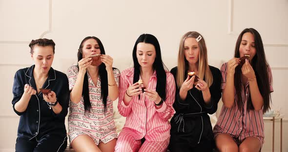 Five Cheerful Ladies in Pajamas Eat Yummy Cupcakes and Have a Lot of Fun Together