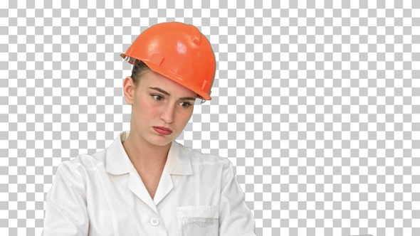 Stressed female engineer in helmet checking, Alpha Channel