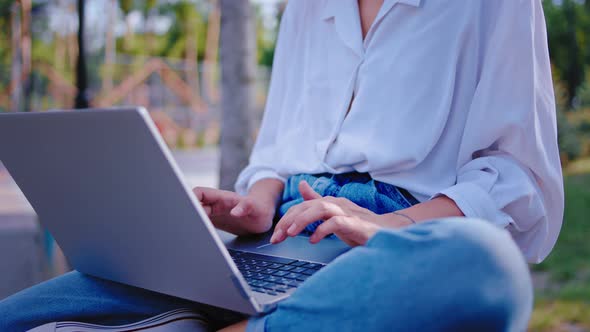 Details of a Lady Student Doing Her Project at alt