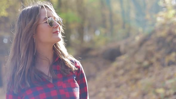 Young woman portrait in autumn Park alt