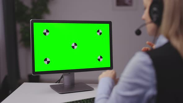 Woman Using Green Pc at Home