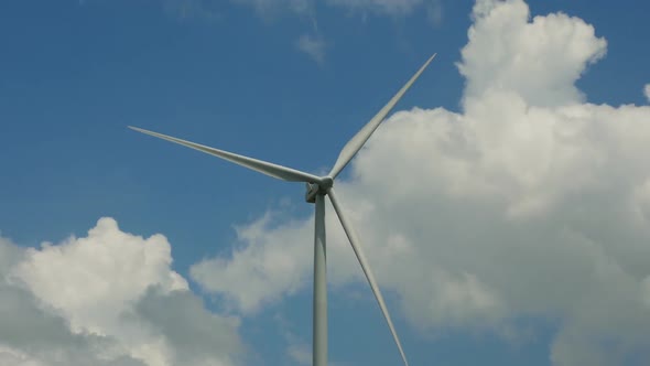 Wind Turbine in Blue Sky alt