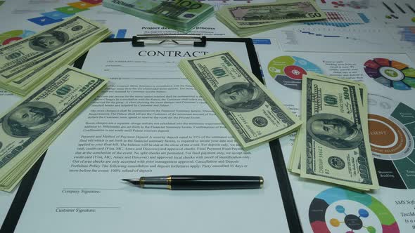 Financial Business Contract And Money On The Table alt