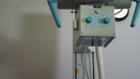 Caucasian male patient, wearing a surgical cap, sleeping in a bed in medical center, with medical eq alt