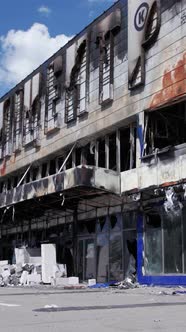 Vertical Video of a Burnt Shopping Center During the War in Bucha Ukraine alt