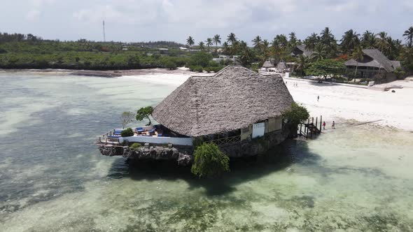 House on Stilts in the Ocean on the Coast of Zanzibar Tanzania alt